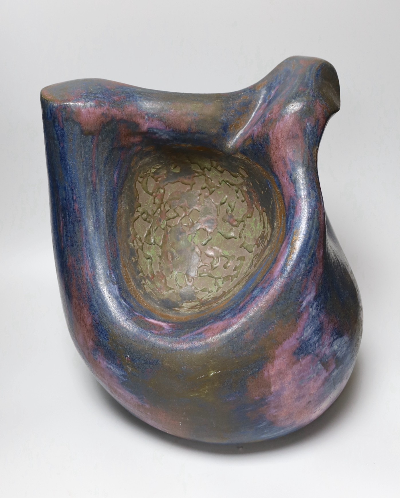 Ruth Sulke - a large studio purple and indigo nickel oxide glazed stoneware bulbous sculpture with flowing lines and hollows, 1985, 34cm, See Sulke, Ruth - Ceramic Sculpture by Ruth Sulke, Hanart 2 Gallery, 1987, page 24